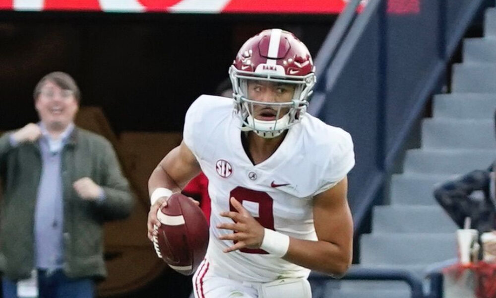 Bryce Young rolls out to pass against Auburn