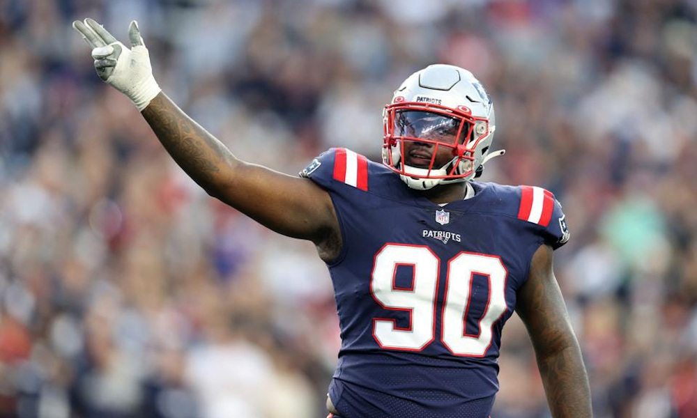 Christian Barmore (#90) celebrates a big play for Patriots in matchup versus New York Jets