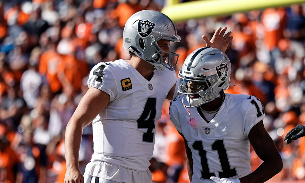 Derek Carr and Henry Ruggs celebrate a touchdown for Raiders versus Broncos in 2021