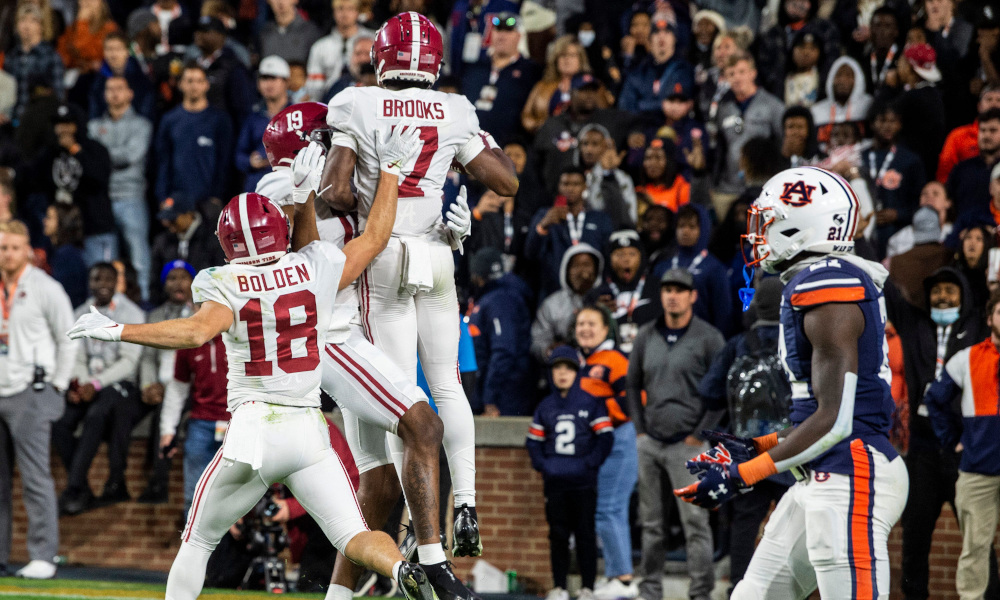 Ja'Corey Brooks (#7) celebrates with teammates for Alabama after winning 2021 Iron Bowl