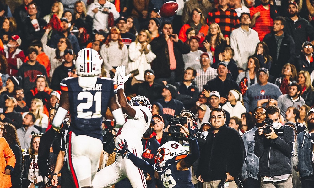 Jacorey Brooks catching football over his shoulder