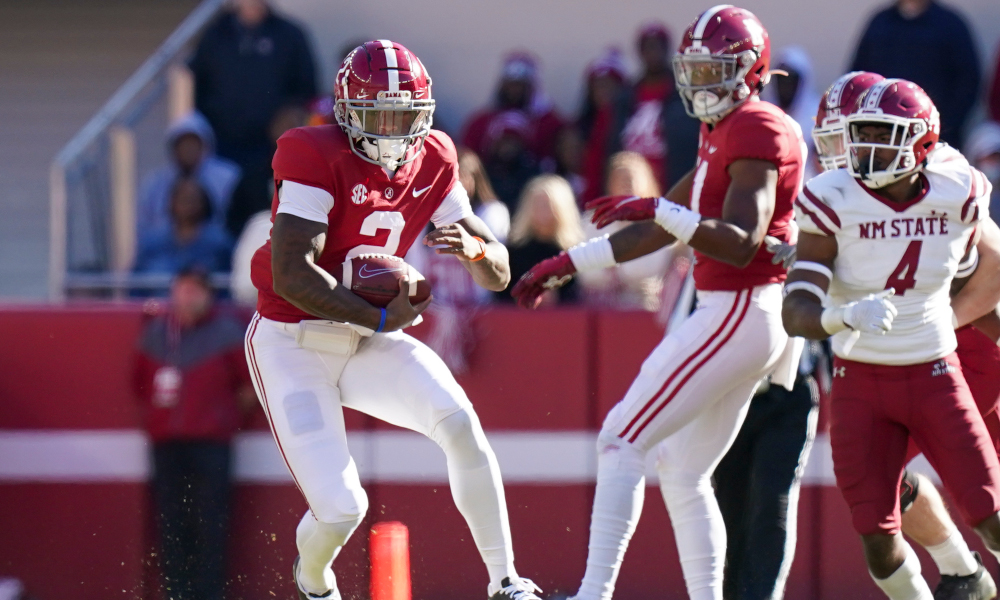 Jalen Milroe (#2) carries the ball at quarterback for Alabama versus New Mexico State