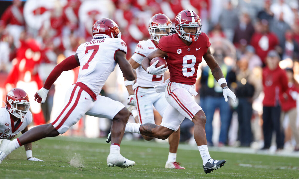 John Metchie runs with the ball vs Arkansas