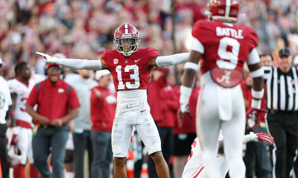 Malachi Moore signals incomplete pass against Arkansas