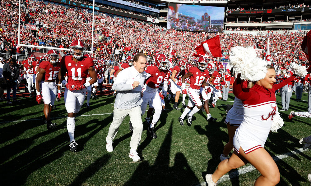Nick Saban leads Alabama out of the tunnel