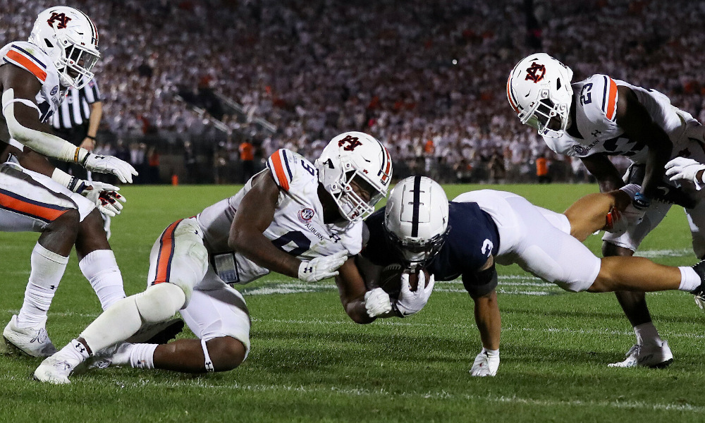 Zakoby McClain (#9) of Auburn called for targeting in 2021 matchup against Penn State