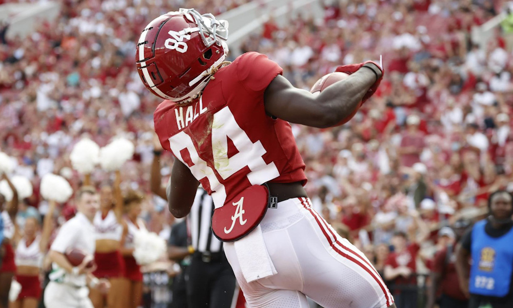 Agiye Hall (No. 84) with a catch for Alabama versus Mercer