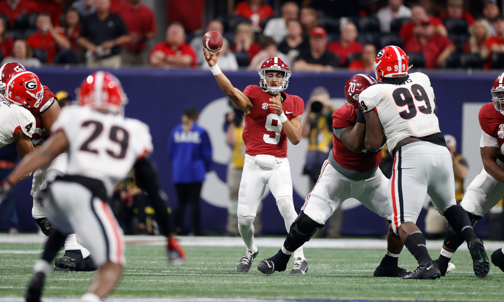 DeVonta Smith congratulates Alabama's Bryce Young for Heisman