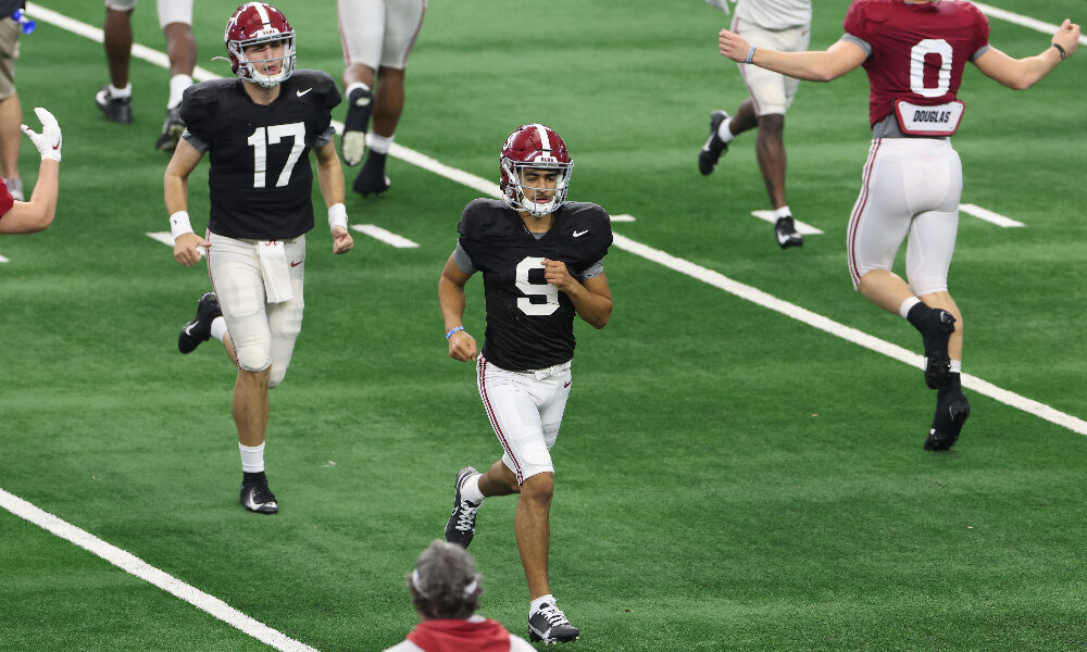 Bryce Young warms up at practice from AT&T Stadium