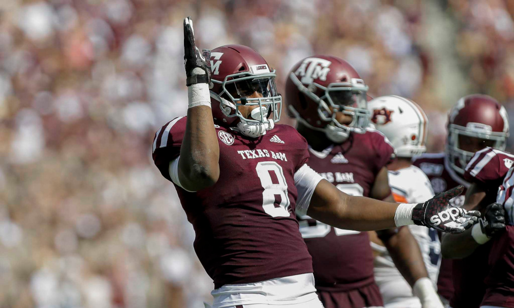DeMarvin Leal (#8) celebrates big play for Texas A&M in 2019 matchup versus Auburn