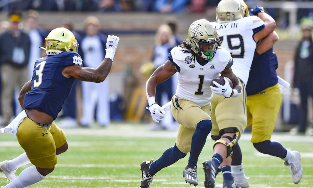 Jahmyr Gibbs (#1) runs the ball for Georgia Tech in 2021 matchup versus Notre Dame