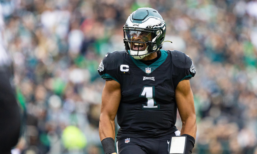 Jalen Hurts (#1) celebrates TD run for Eagles in 2021 game versus New Orleans Saints