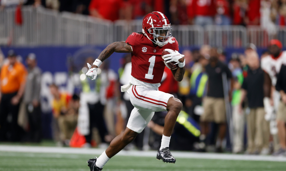 Jameson Williams (#1) runs for a 67-yard touchdown for Alabama in 2021 SEC Championship Game
