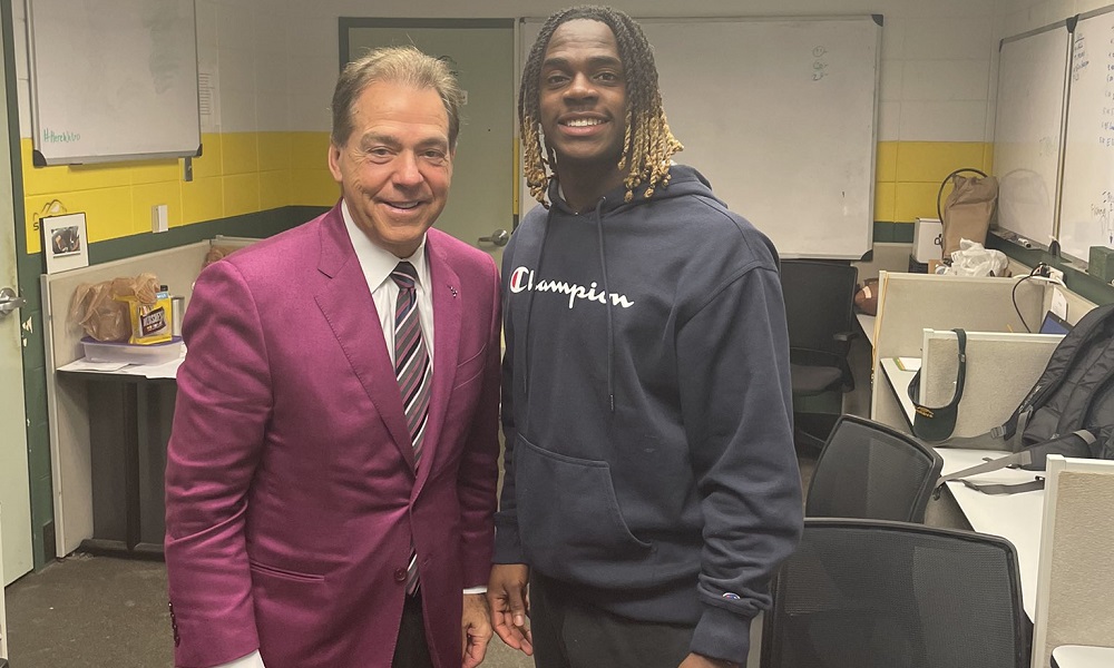 Nick Saban takes picture with Kendrick Law during visit to Louisiana