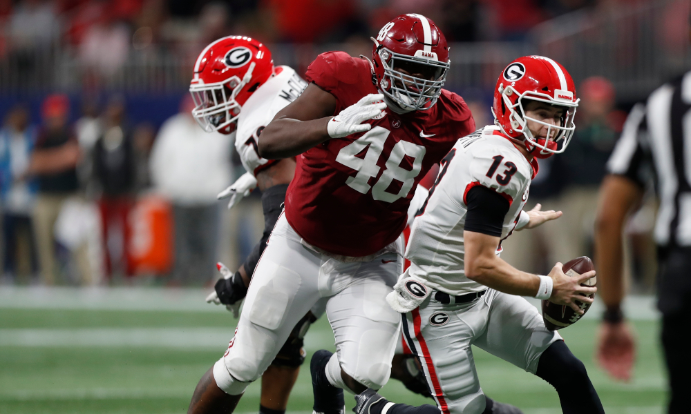 Phidarian Mathis (#48) pressuring Stetson Bennett of Georgia in 2021 SEC Championship Game