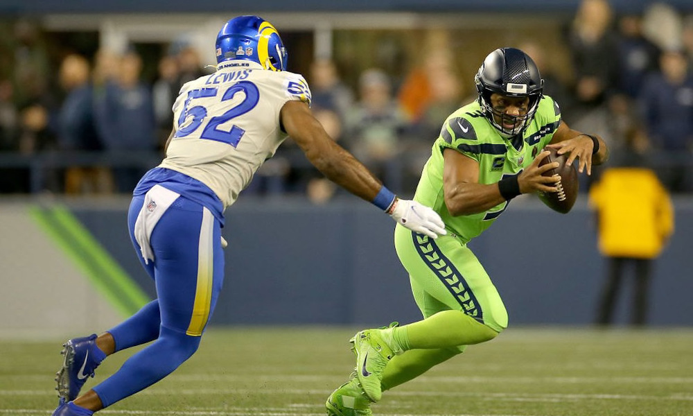Terrell Lewis (#52) pressures Seahawks QB Russell Wilson in 2021 matchup for Los Angeles Rams