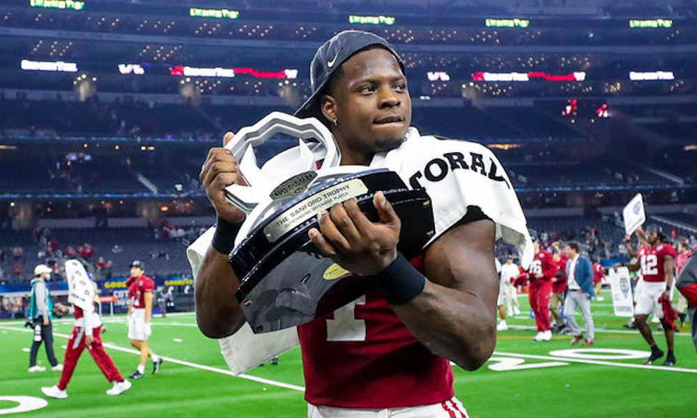 Brian Robinson Jr. walks off the field with Most Outstanding Offensive Player honor for Alabama in Cotton Bowl Classic