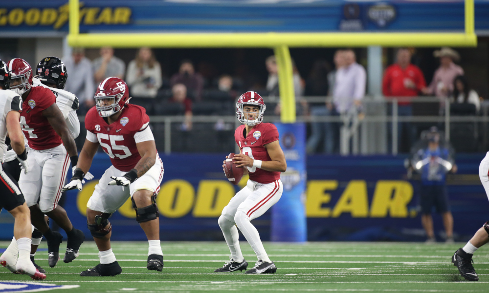 Bryce Young (#9) of Alabama throws a pass versus Cincinnati in the Goodyear Cotton Bowl