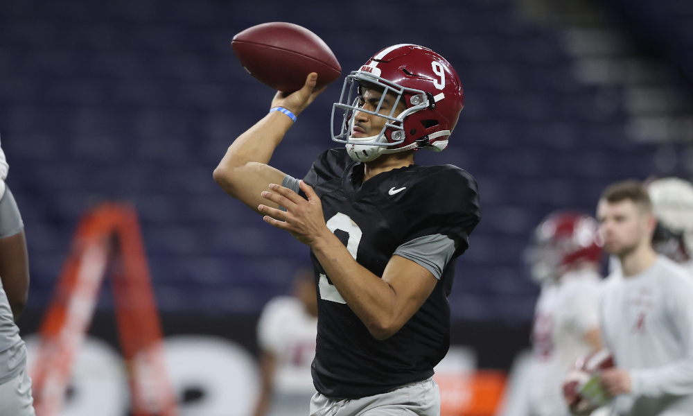 Bryce Young (#9) attempts a pass in practice for Alabama at Lucas Oil Stadium for CFP National Championship Game