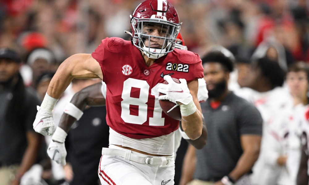 Cameron Latu (#81) runs after the catch for Alabama in 2022 CFP National Championship Game versus Georgia