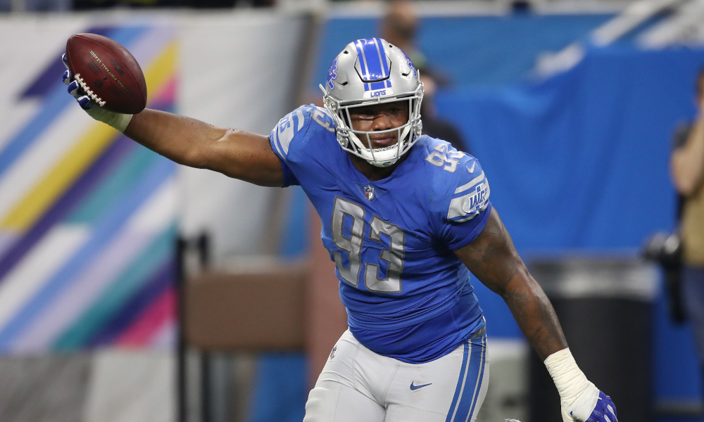 Da'Shawn Hand (#92) celebrates a fumble recovery for Lions versus Packers in 2018