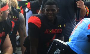 Emmanuel Henderson smiles during Under Armour All-AMerica practice