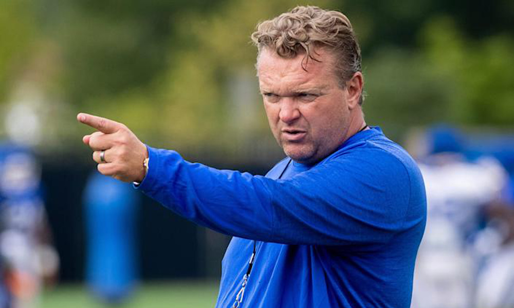 Eric Wolford, Kentucky's offensive line coach, directing signals in practice for the Wildcats in 2021