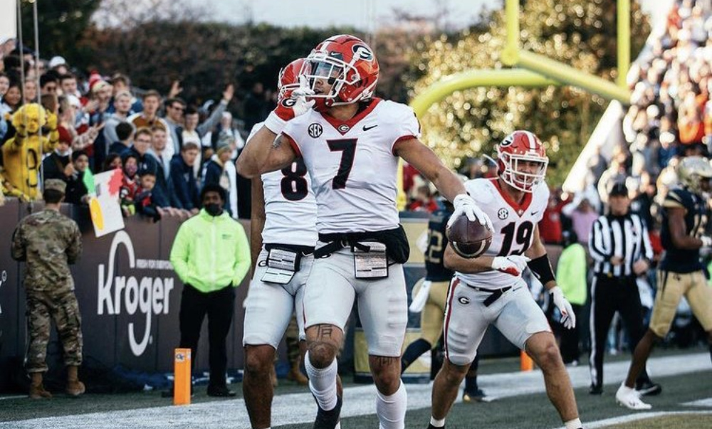 Jermaine Burton (#7) celebrates a TD for Georgia versus Georgia Tech in 2021