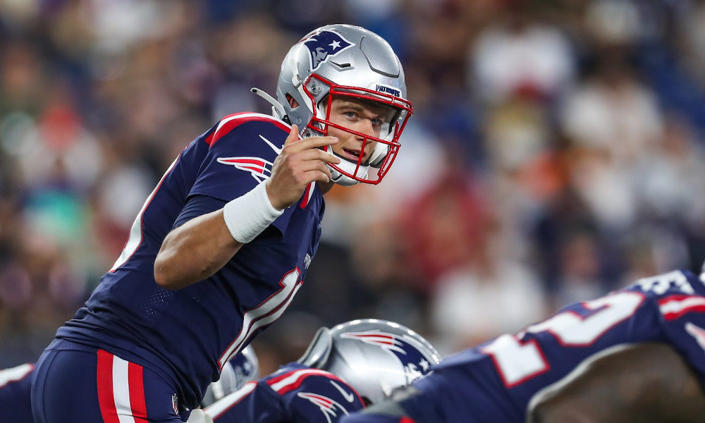 Mac Jones under center giving signals for Patriots in 2021 season