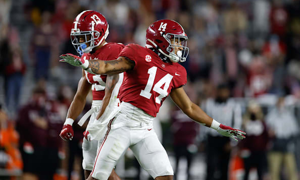 Malachi Moore and Brian Branch celebrate a defensive play for Alabama in 2020