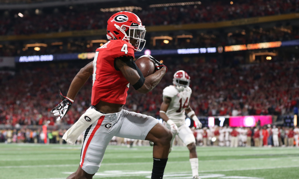 Mecole Hardman (#4) runs for a touchdown for Georgia in 2018 CFP National Championship Game versus Alabama
