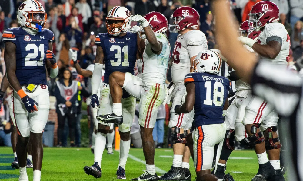 John Metchie celebrates with Crimson Crane vs Auburn