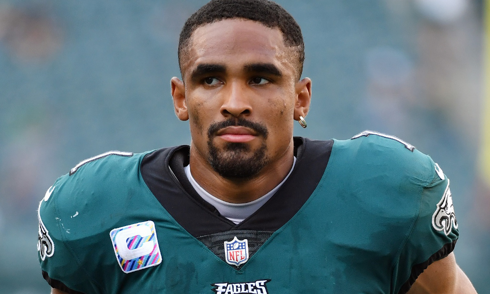 Jalen Hurts walks off the field after Eagles loss to Chiefs in 2021 regular season