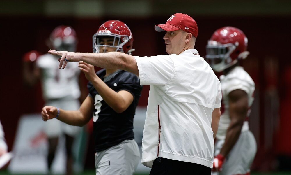 Bill O'Brien giving signals to Alabama quarterbacks during spring practice for Alabama in 2021