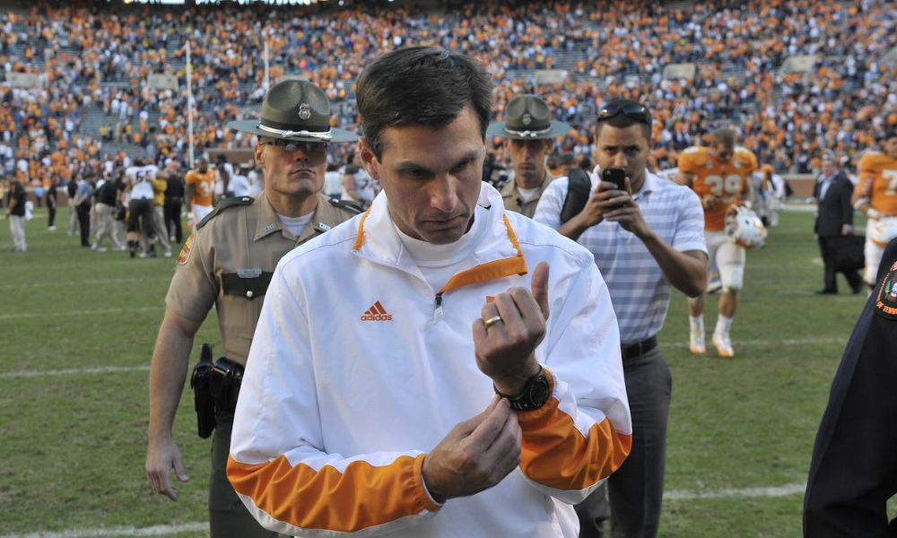 Derek Dooley walks off the field in 2012 after Tennessee's loss to Missouri