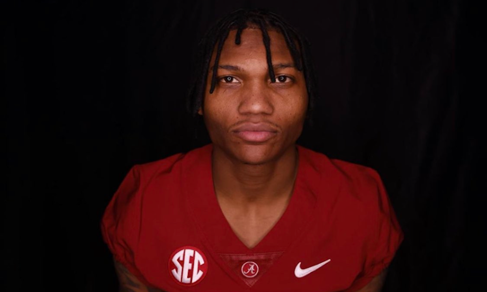 Alabama CB Eli Ricks posing in Crimson jersey