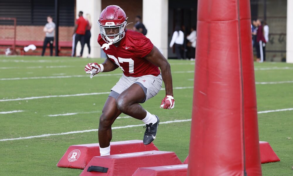 Alabama LB Demouy Kennedy (#37) working through drills in Alabama's first practice of spring football