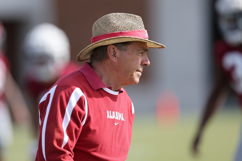 Alabama head coach Nick Saban looking at players participating in 2022 spring practice