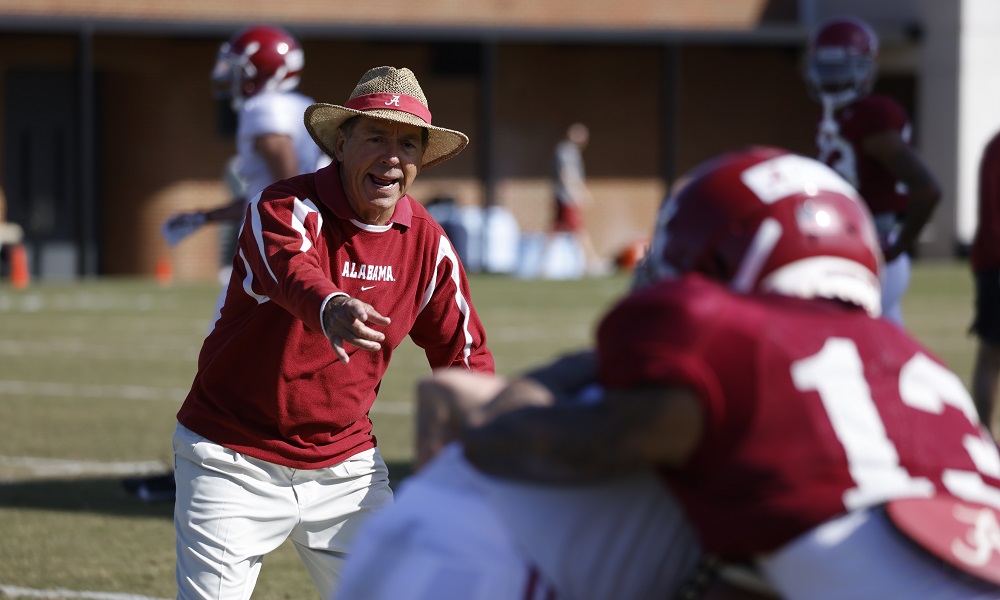Nick Saban instructing Alabama defensive backs in 2022 spring football practice