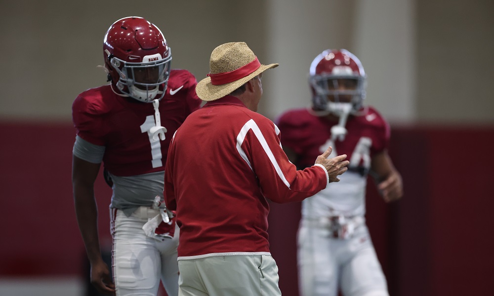 Alabama head coach Nick Saban instructing players at 2022 Spring Football Practice