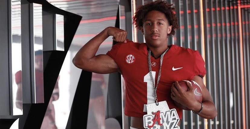 Bryson Rodgers flexes arm during Alabama visit