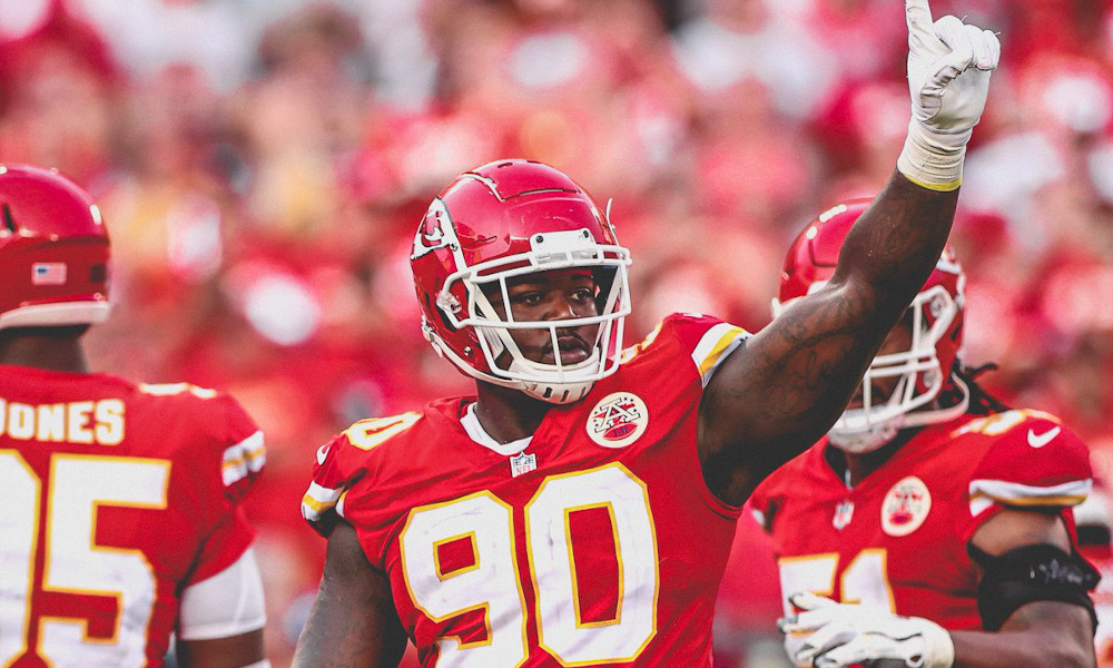 Photo of Jarran Reed (#90) celebrating a big play for Kansas City Chiefs in 2021 season