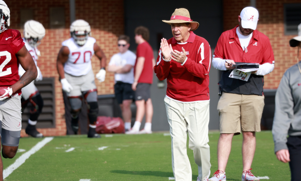 Nick Saban claps his hands as Alabama opens 2022 spring practice