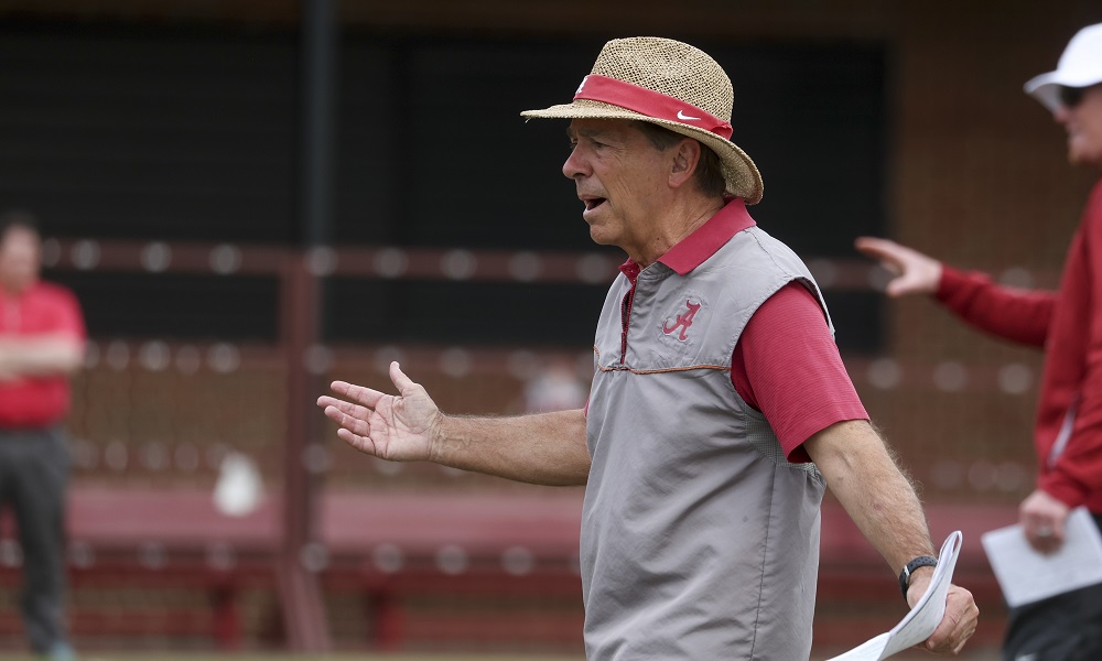 Nick Saban giving signals and coaching Alabama players in 2022 Spring Football Practice