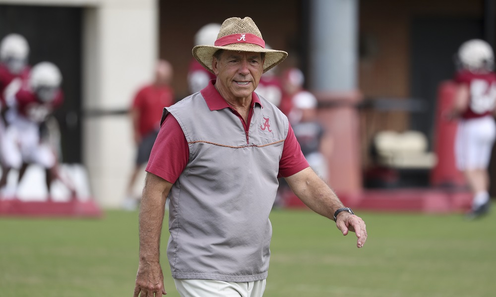 Nick Saban smiling on the field in Alabama's 2022 Spring Football Practice