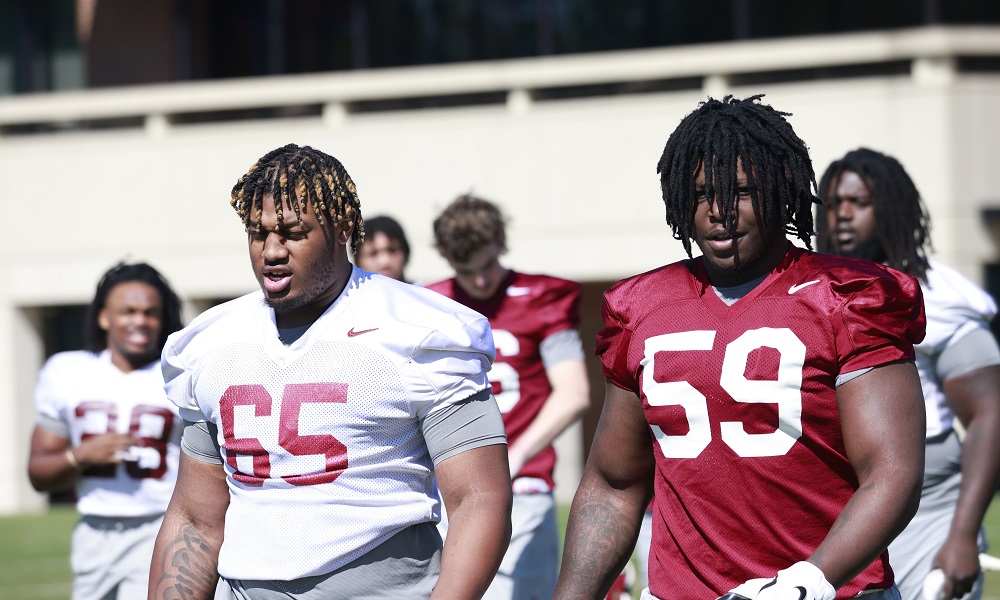 Alabama OL JC Latham (#65) on the field for 2022 Spring Football Practice