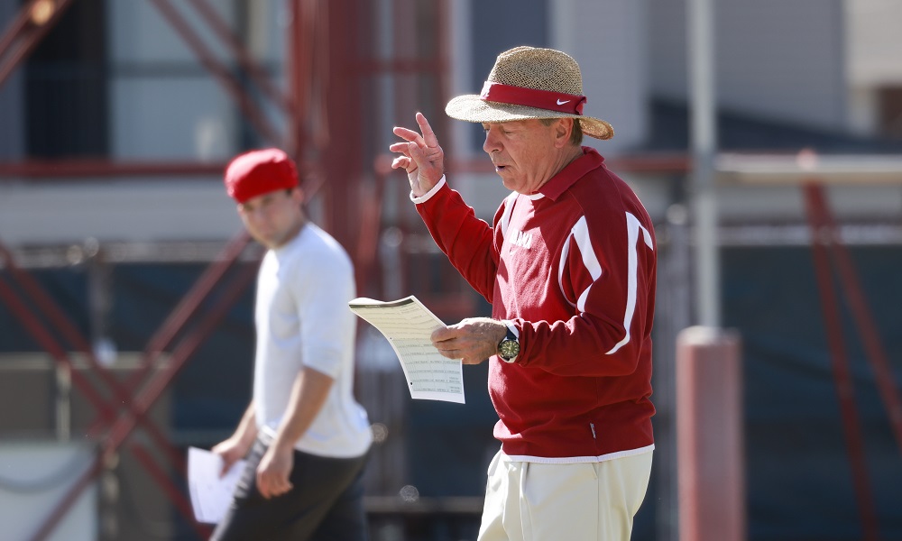 Alabama head coach Nick Saban looking at his play sheet during 2022 Spring Football Practice