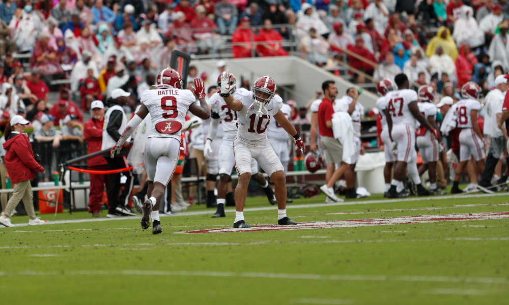 Alabama DB Jordan Battle (#9) celebrates an interception with LB Henry To'oto'o (#10) in 2022 A-Day Game