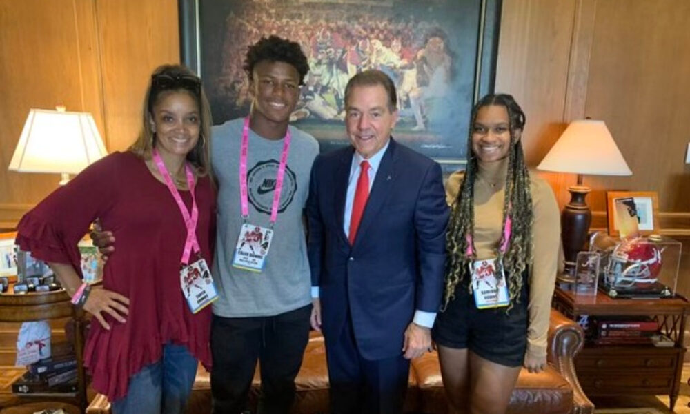 Caleb Downs and his family with Nick Saban during visit