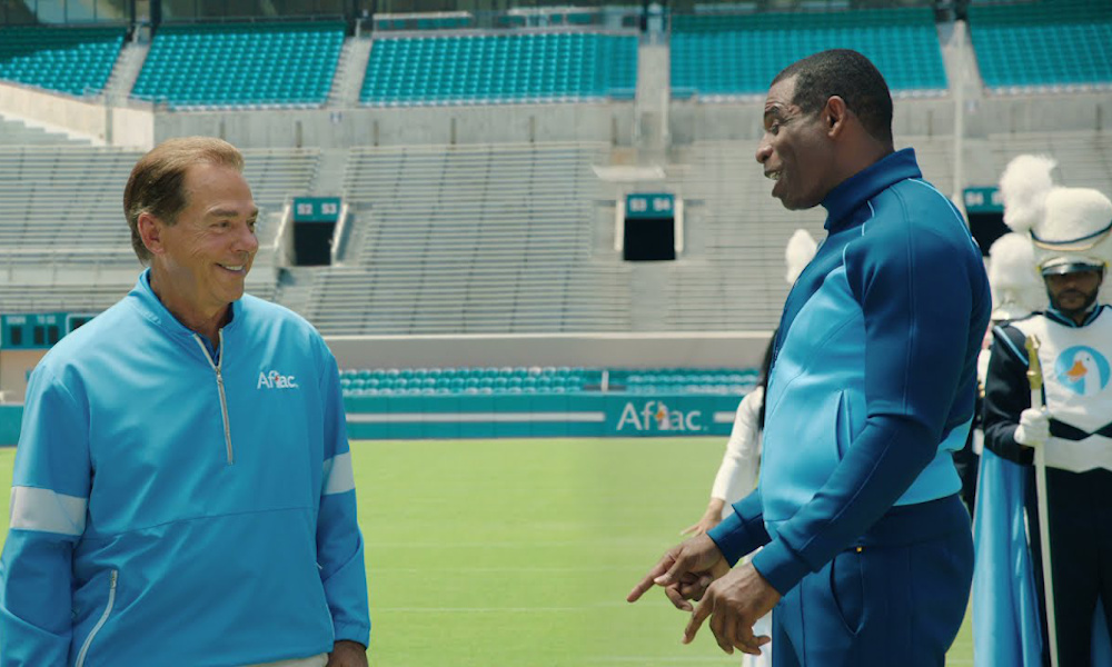 Nick Saban and Deion Sanders having fun in Aflac Commercial